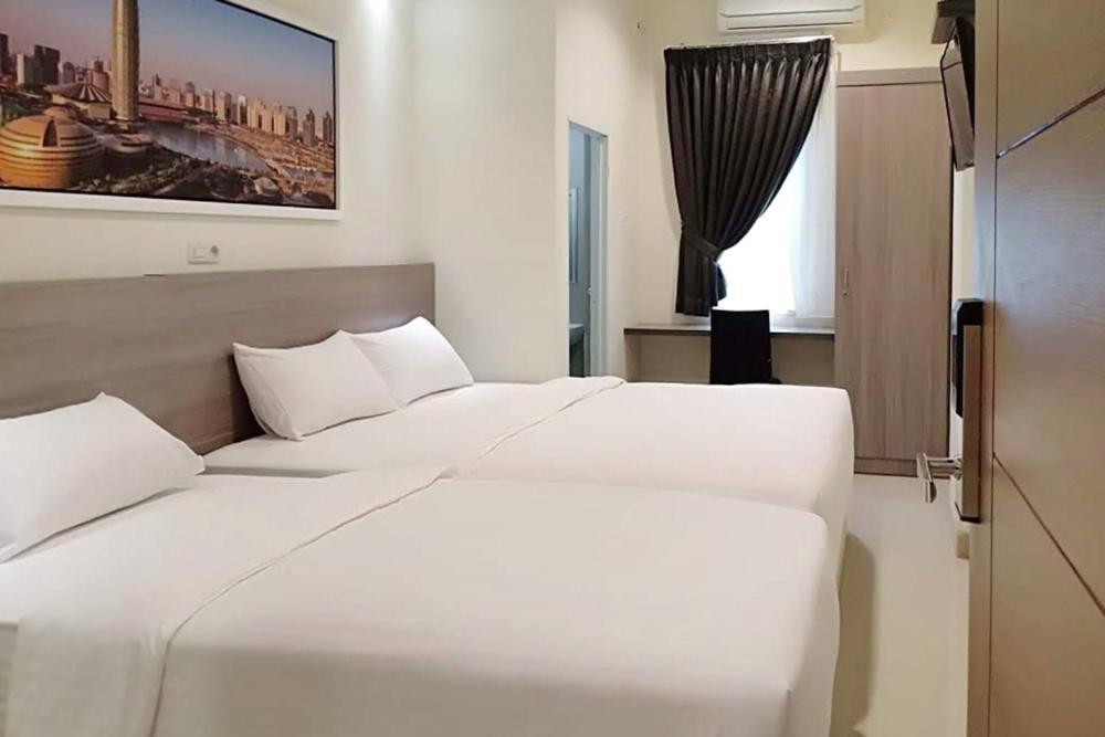 Twospaces Living At Maximus Inn Palembang Kültér fotó