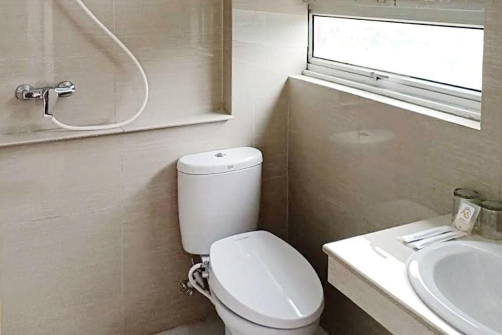 Twospaces Living At Maximus Inn Palembang Kültér fotó